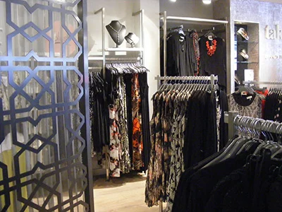 DSCF0096 A beautiful display adult evening-wear including dresses, jewellery and shoes in a Taking Shape shop with shop fittings and laser cut screen by Dymond Engineering