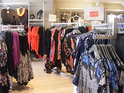 Taking-Shape-Retail-Shopfittings-in-Stainless-Steel A stunning display adult-wear including dresses and blouses in an LC Waikiki shop with shop fittings by Dymond Engineering